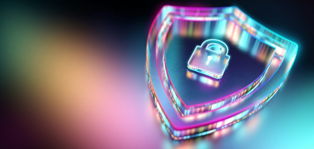 Modern ethereal visual of a semi-translucent shield symbol with a lock symbol inside the shield, and modern colourful lighting reflecting on the scene around it. Showcases the Microsoft Sentinel SIEM's security for CloudAssist.